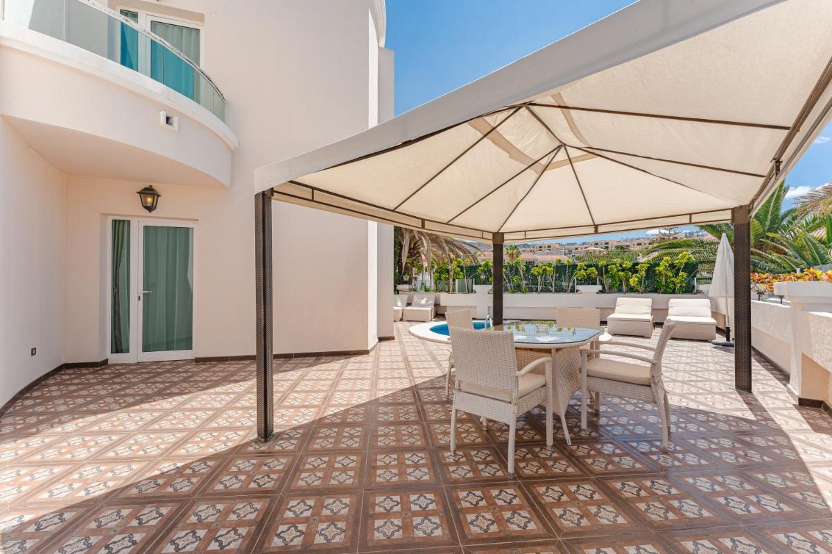 Un balcón o terraza de Flamingo Suites Boutique Hotel