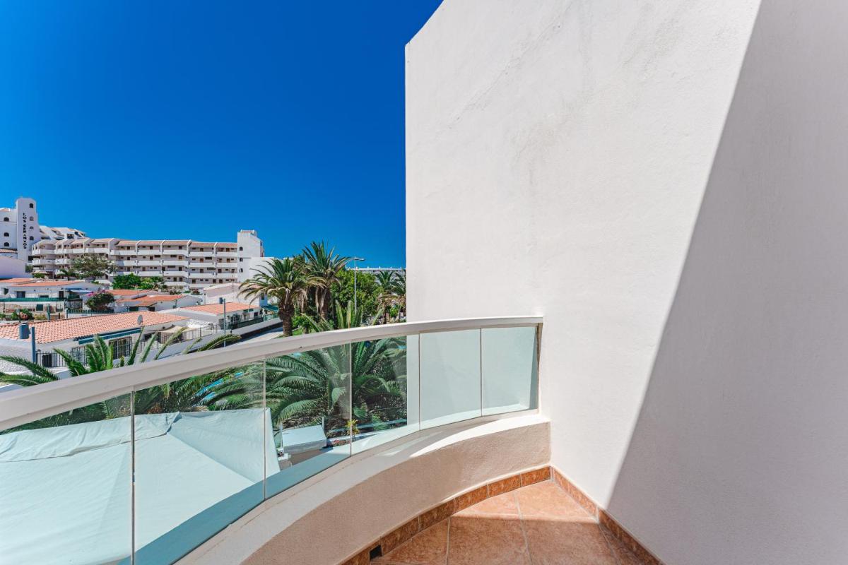 Un balcón o terraza de Flamingo Suites Boutique Hotel
