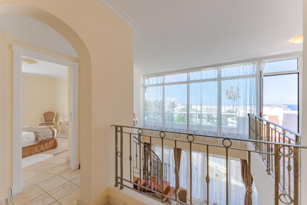 Zona de estar de Flamingo Suites Boutique Hotel
