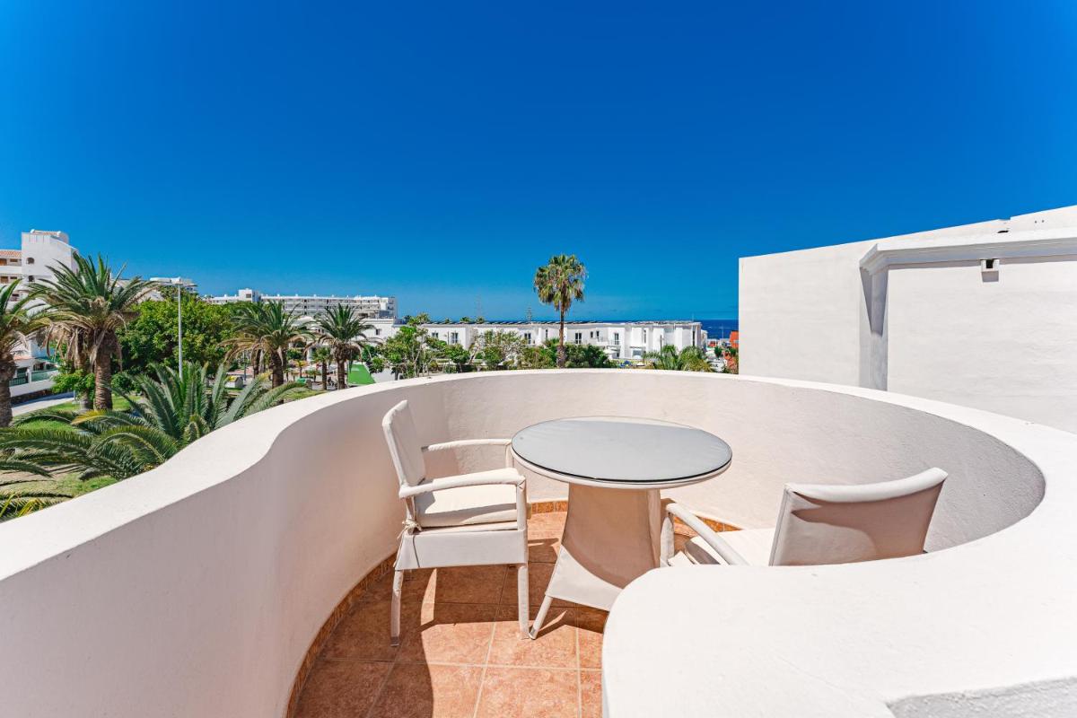 Un balcón o terraza de Flamingo Suites Boutique Hotel