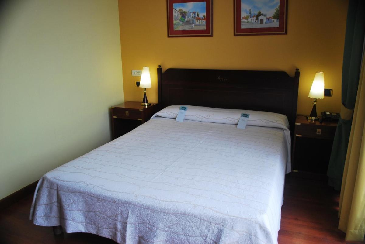 Cama o camas de una habitación en Hotel Puerto de Las Nieves