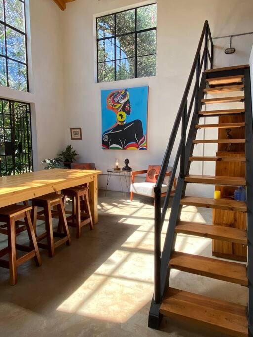 Modern Loft House with Exposed Timber Trusses - Housity