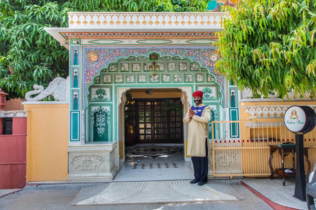 a man standing in front of a building at Shahpura House in Jaipur