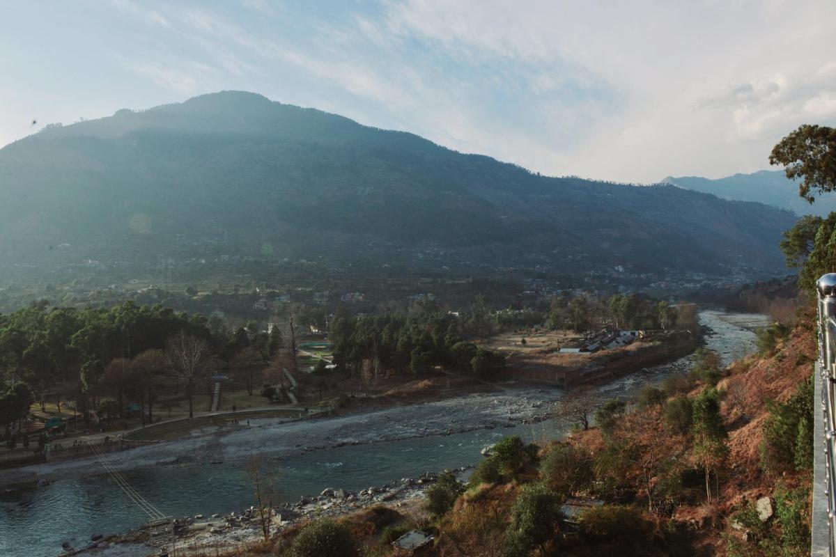 Tulip Flowing River View Hotel. - Housity