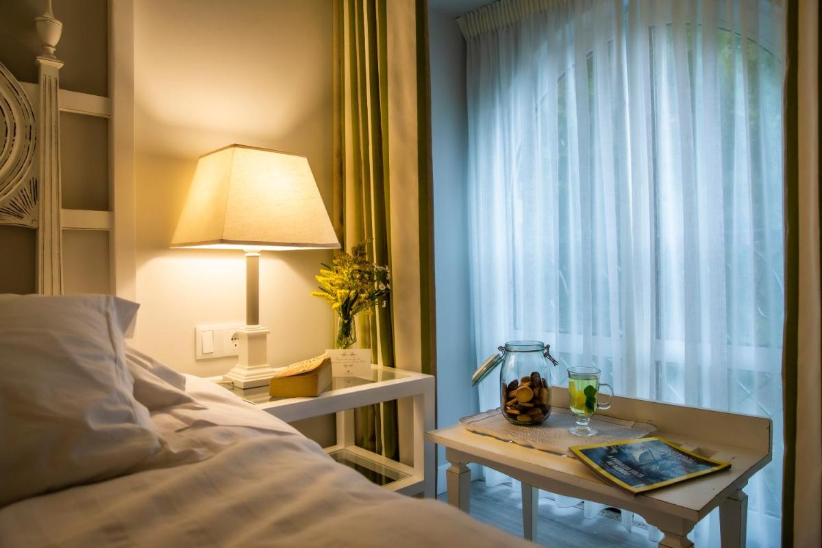Uma cama ou camas num quarto em Grande Hotel das Caldas da Felgueira