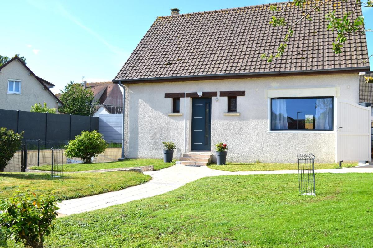 Maison avec jardin clos entre Caen et la mer - Housity