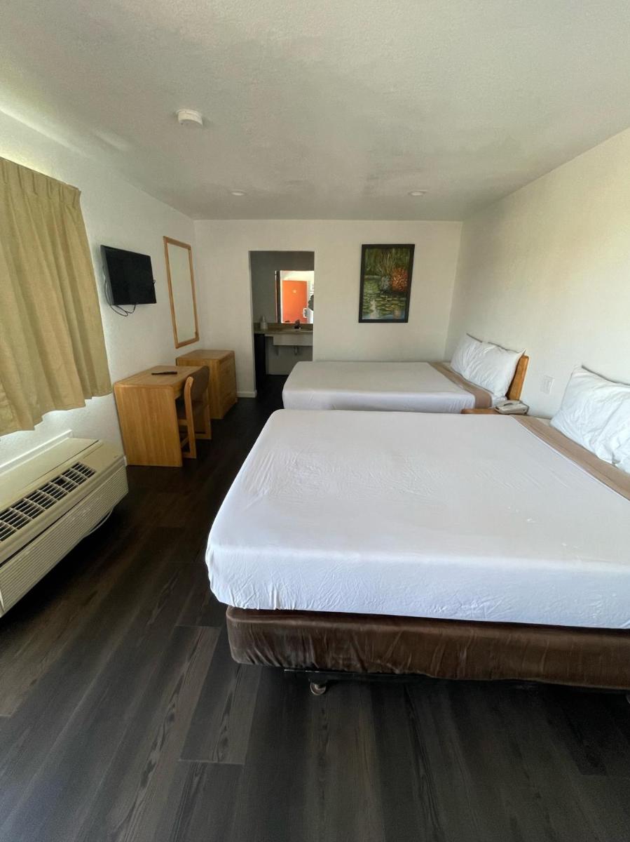 Palms Inn & Suites - Housity
