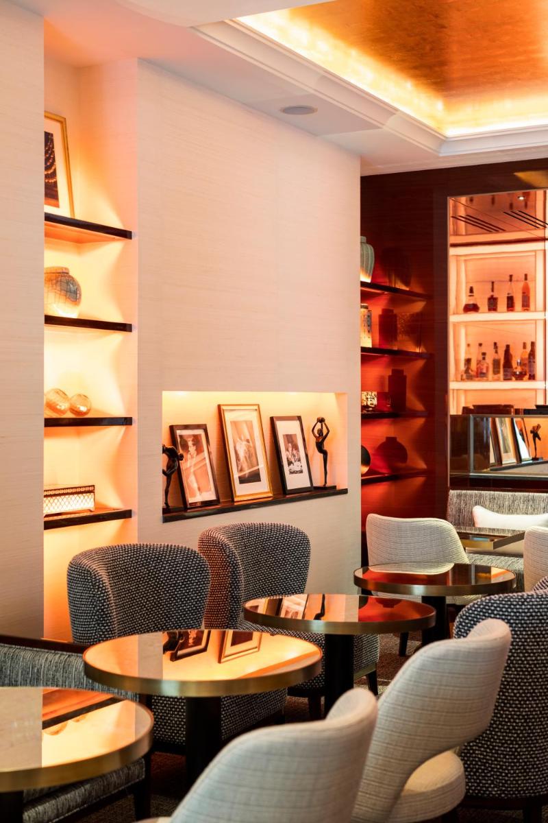 Coin salon dans l'établissement Hotel Montaigne