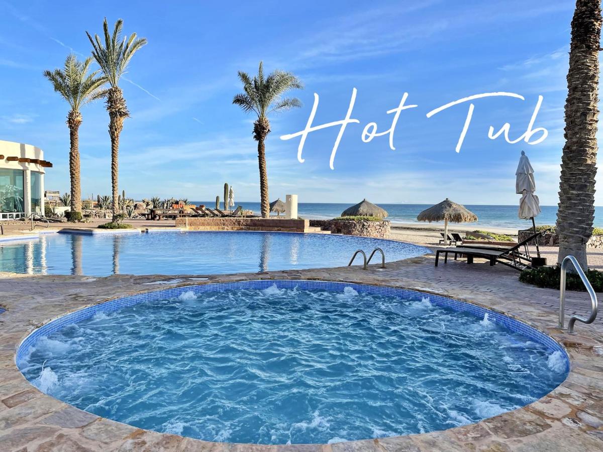 Upscale Beachfront Condo with Tub and Private Beach - Housity
