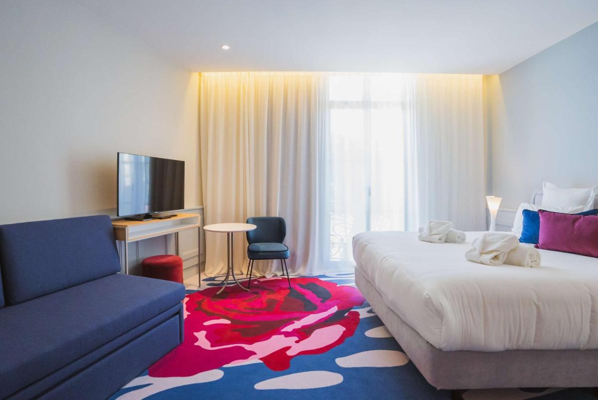 Un ou plusieurs lits dans un hébergement de l'établissement Eden Rose Grand Hotel BW Premier Collection