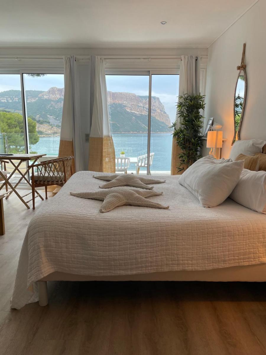 Un ou plusieurs lits dans un hébergement de l'établissement Hotel de La Plage - Mahogany