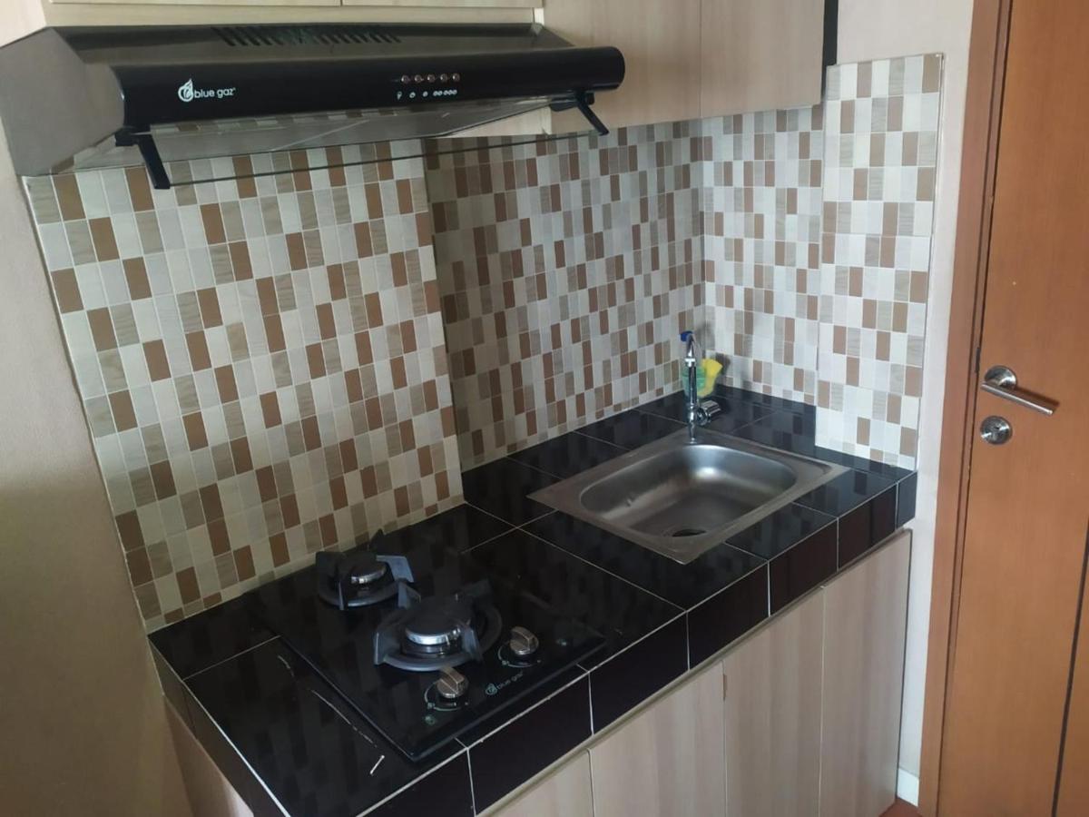 RedLiving Apartemen Margonda Residence 5 - Ens Room with Netflix and Breakfast - Housity