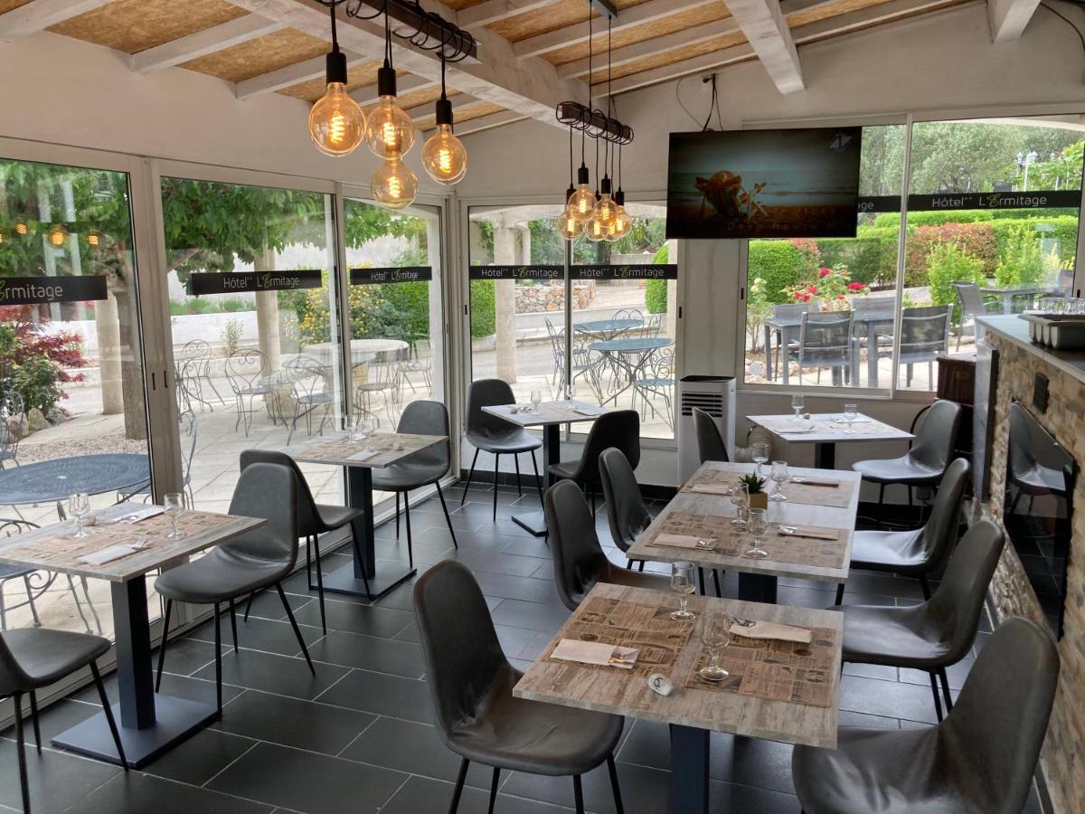 Restaurant ou autre lieu de restauration dans l'établissement Hôtel Spa L'Ermitage