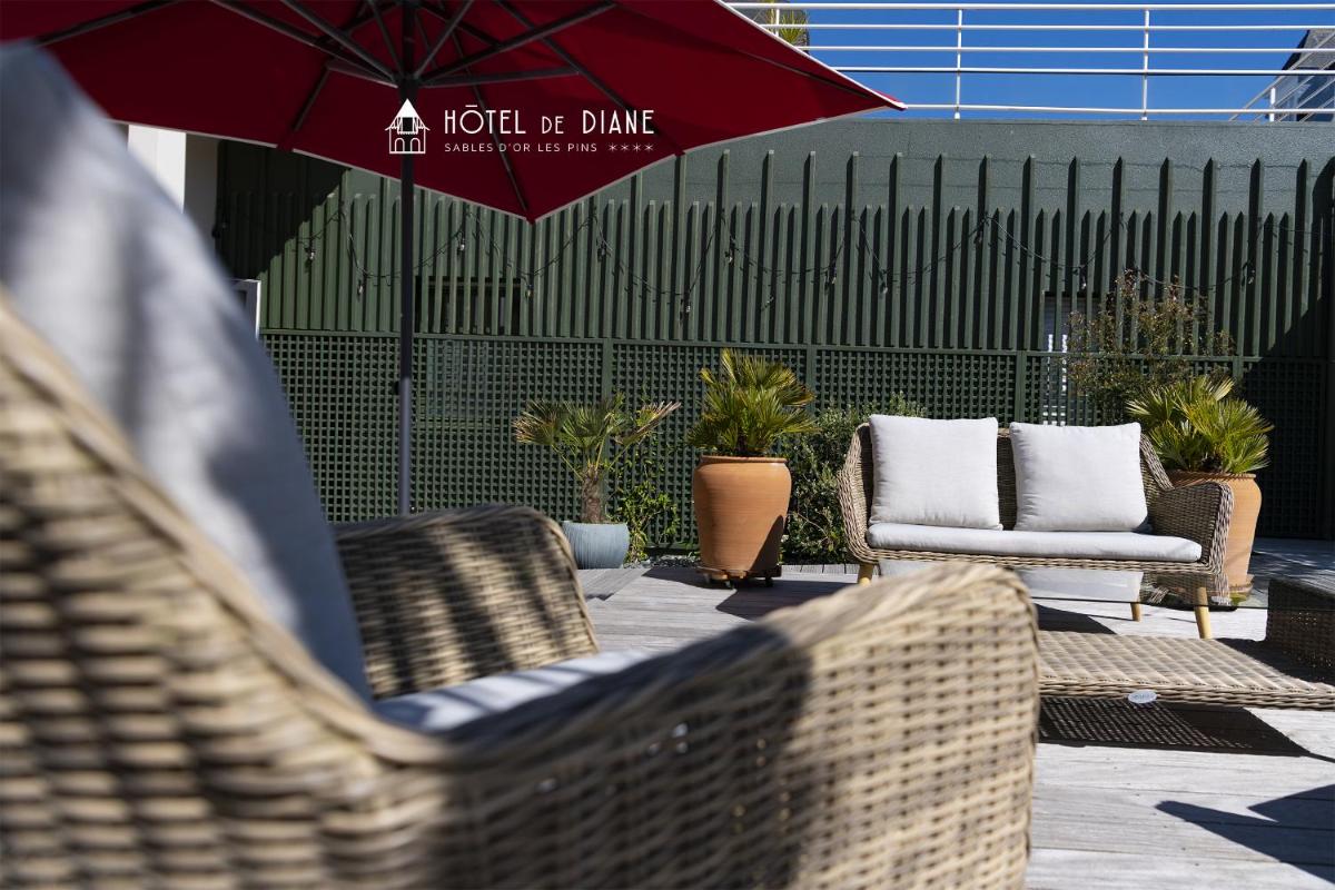 Coin salon dans l'établissement Hotel De Diane