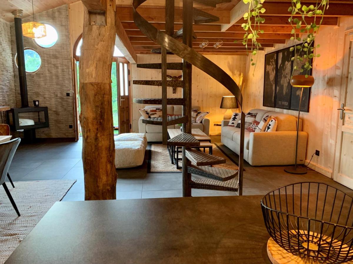 Coin salon dans l'établissement Domaine de Chalvêches Hôtel SPA 4*