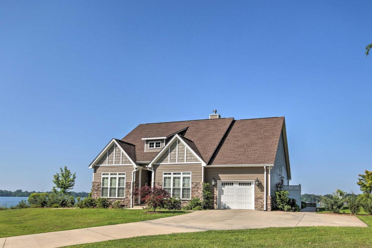 Elegant Lakefront Gem with Dock and Sunset Views! - Housity