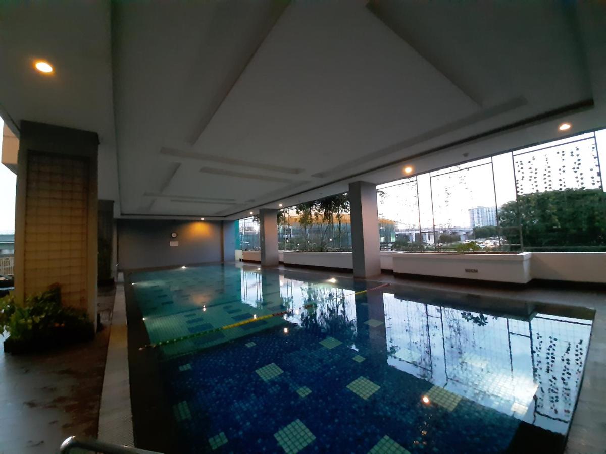 Cozy The H Residence Cawang by Bonzela Property - Housity