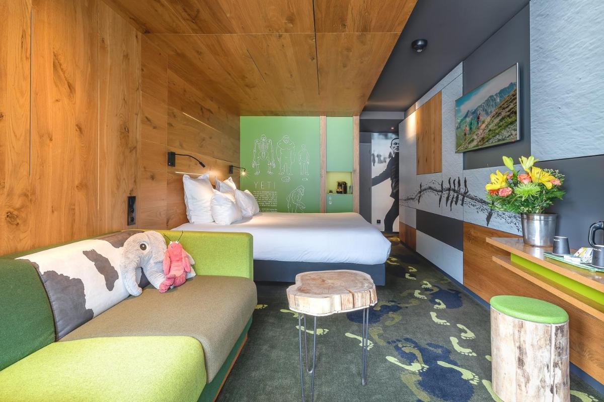 Un ou plusieurs lits dans un hébergement de l'établissement Alpina Eclectic Hotel
