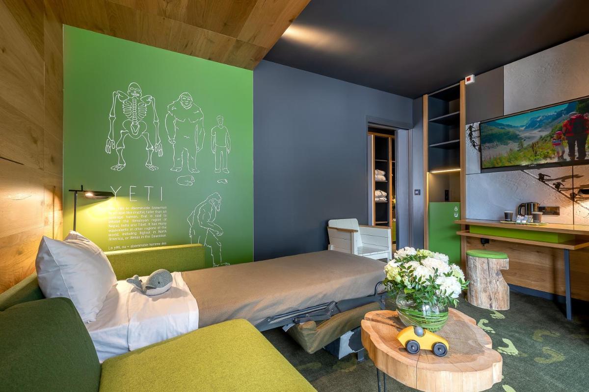 Un ou plusieurs lits dans un hébergement de l'établissement Alpina Eclectic Hotel