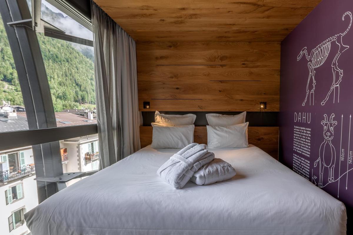 Un ou plusieurs lits dans un hébergement de l'établissement Alpina Eclectic Hotel