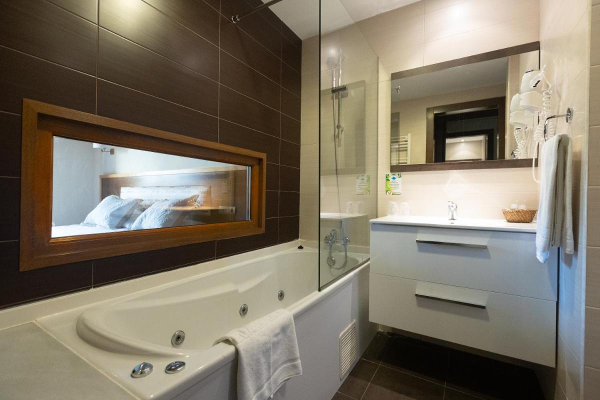 Un baño de Hotel & Spa Villa de Mestas