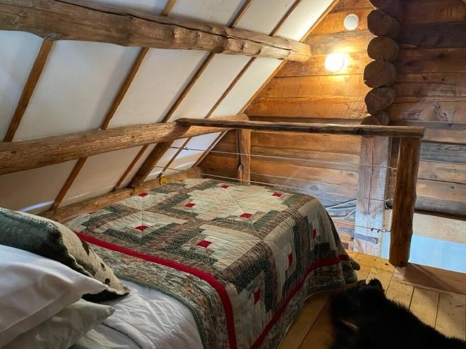 Tiny Log Cabin with Loft on Creek - Housity