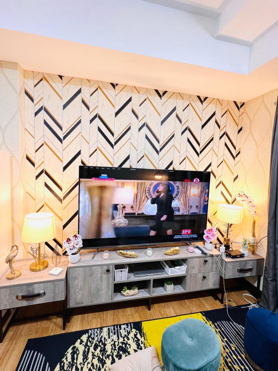 New Cozy 2 bedroom unit condotel for staycation with living room and kitchen set with pool - Housity