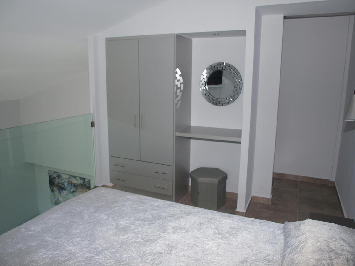 Attic Apartments - Housity