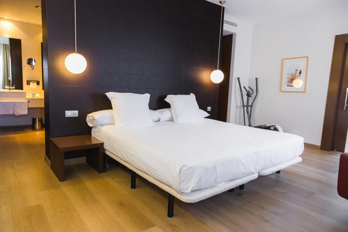 Cama o camas de una habitación en Hotel Veracruz Plaza & Spa