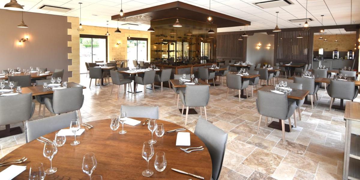 Restaurant ou autre lieu de restauration dans l'établissement Hotel Le Perigord