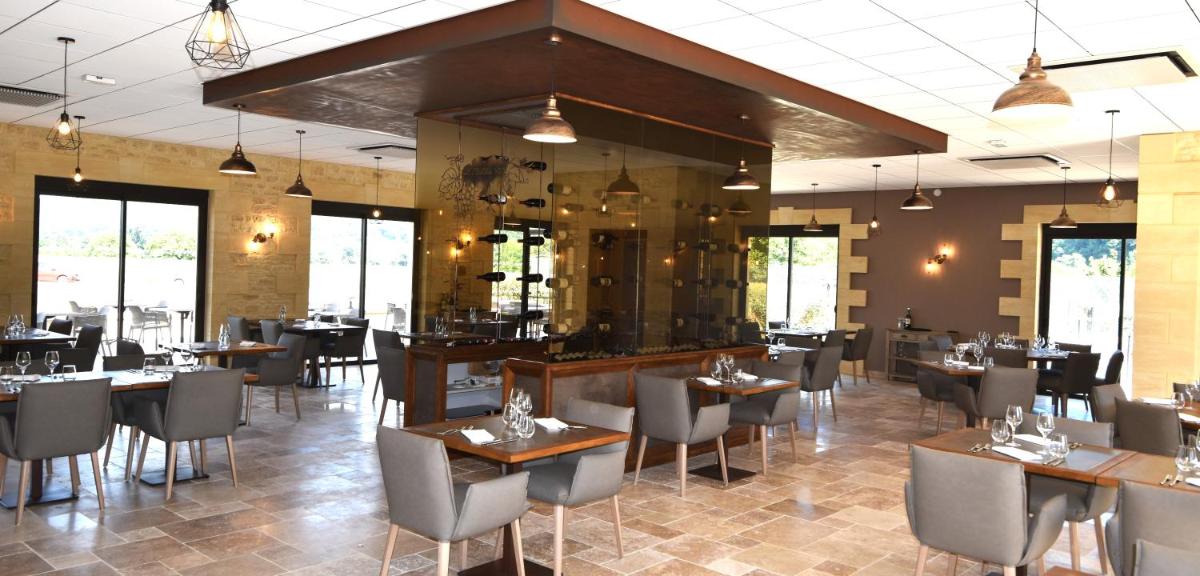Restaurant ou autre lieu de restauration dans l'établissement Hotel Le Perigord