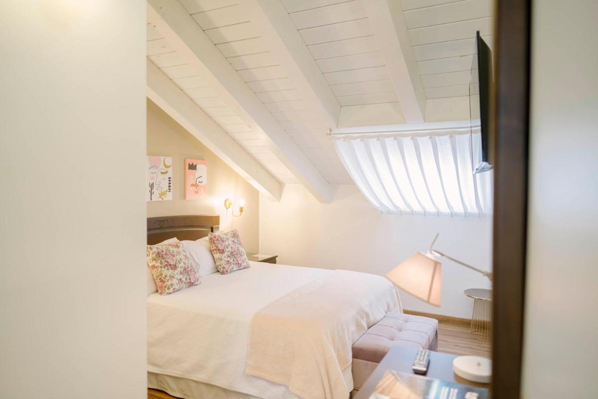 Cama o camas de una habitación en Hotel & Spa María Manuela