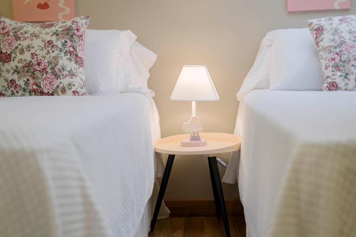 Cama o camas de una habitación en Hotel & Spa María Manuela