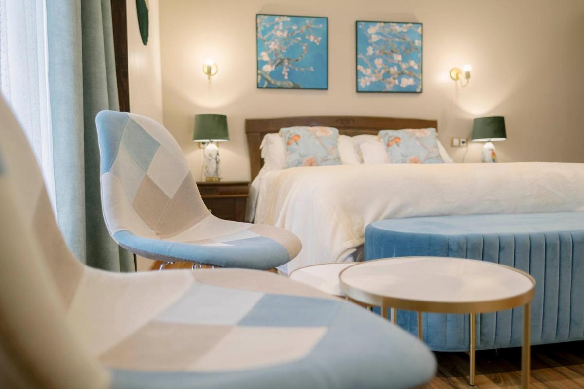 Cama o camas de una habitación en Hotel & Spa María Manuela