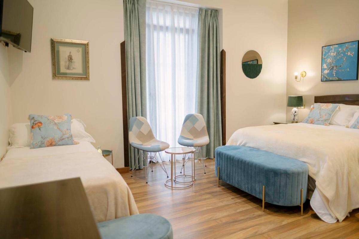 Cama o camas de una habitación en Hotel & Spa María Manuela