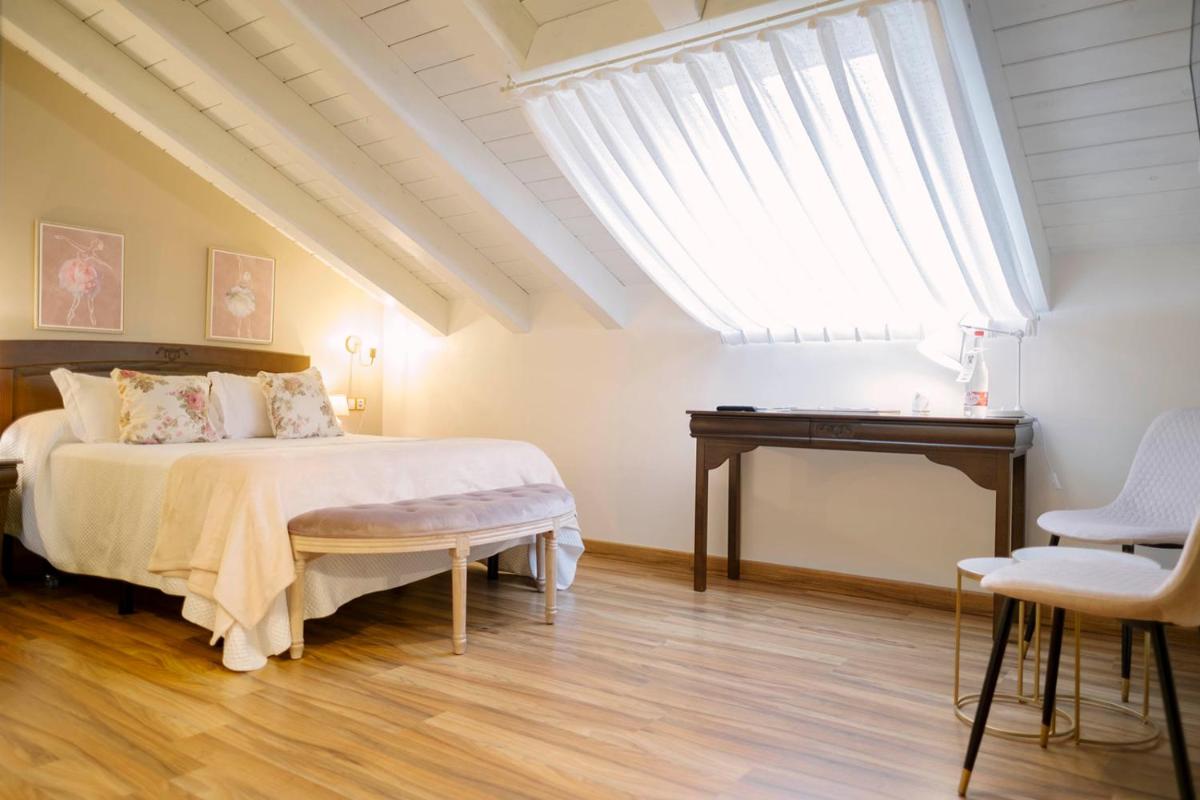 Cama o camas de una habitación en Hotel & Spa María Manuela