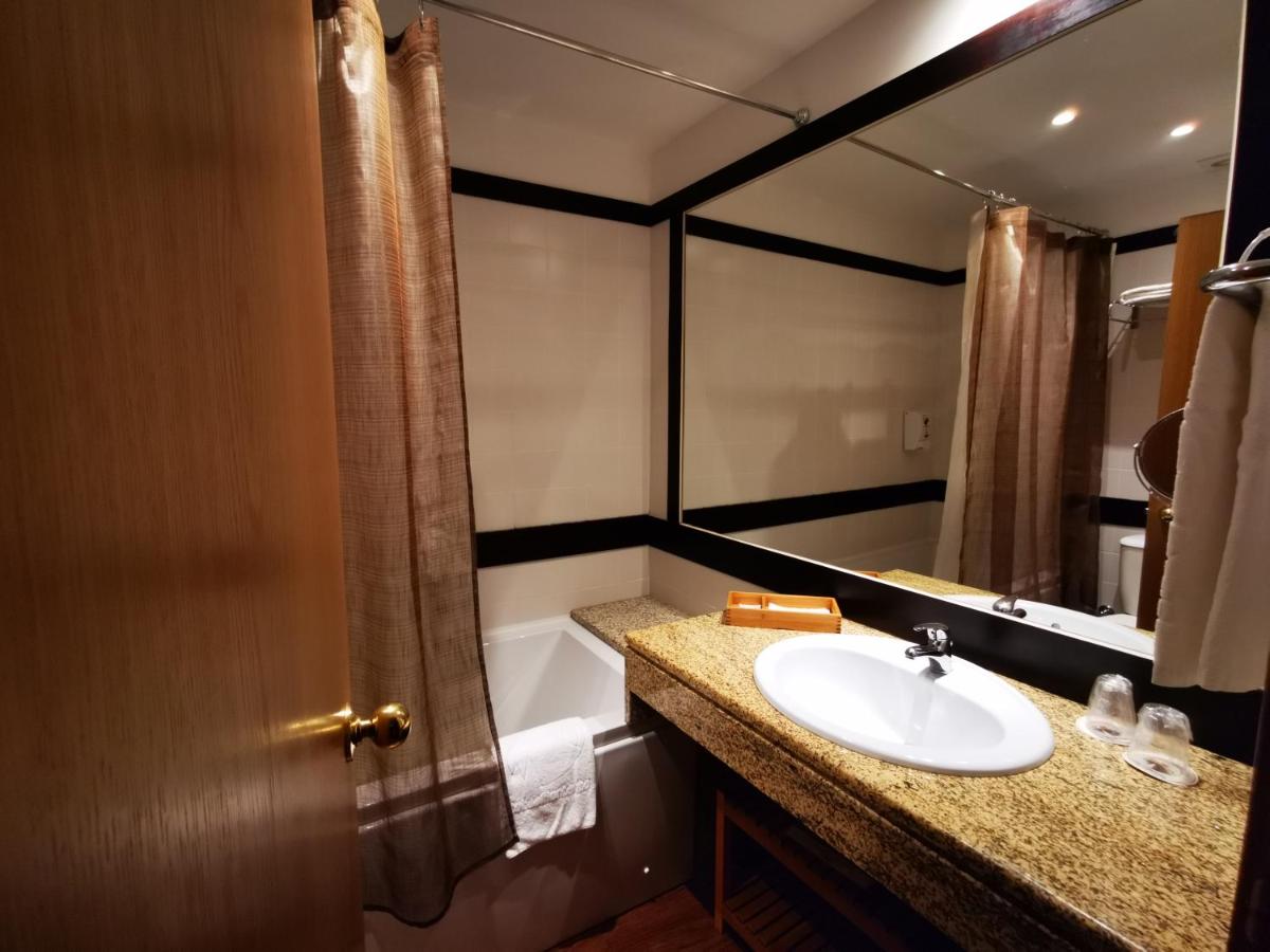 Uma casa de banho em Hotel Da Montanha
