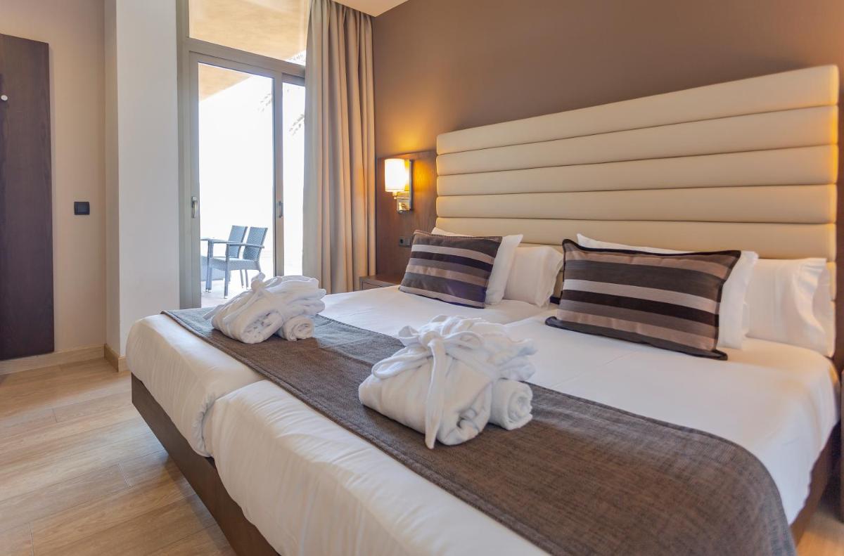 Cama o camas de una habitación en Marins Beach Club - Adults Only Hotel