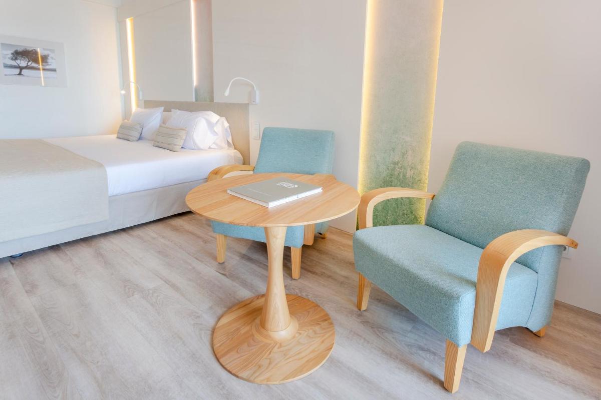 Cama o camas de una habitación en Marins Beach Club - Adults Only Hotel