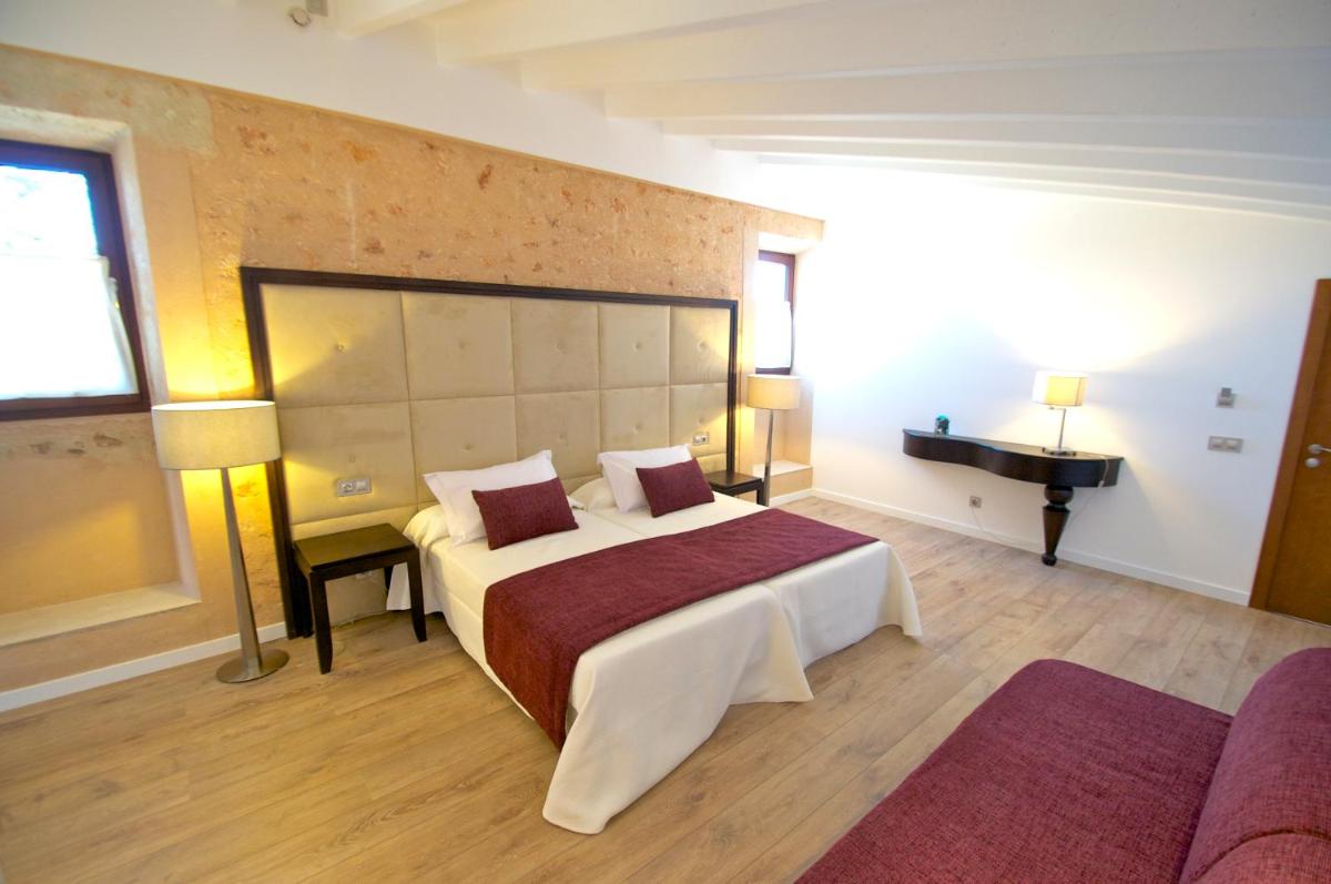 Cama o camas de una habitación en Bennoc Petit Hotel - Only Adults