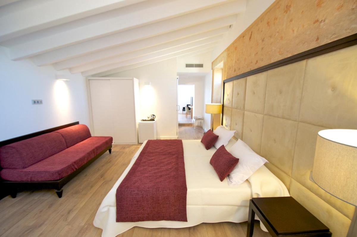 Cama o camas de una habitación en Bennoc Petit Hotel - Only Adults