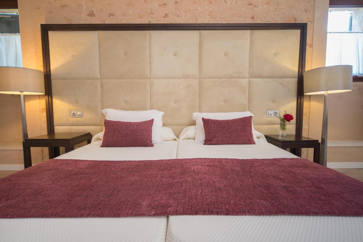 Cama o camas de una habitación en Bennoc Petit Hotel - Only Adults
