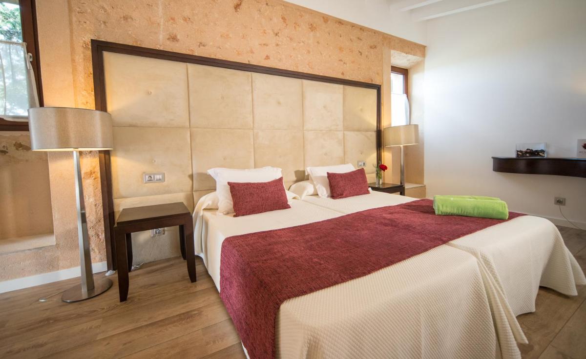 Cama o camas de una habitación en Bennoc Petit Hotel - Only Adults