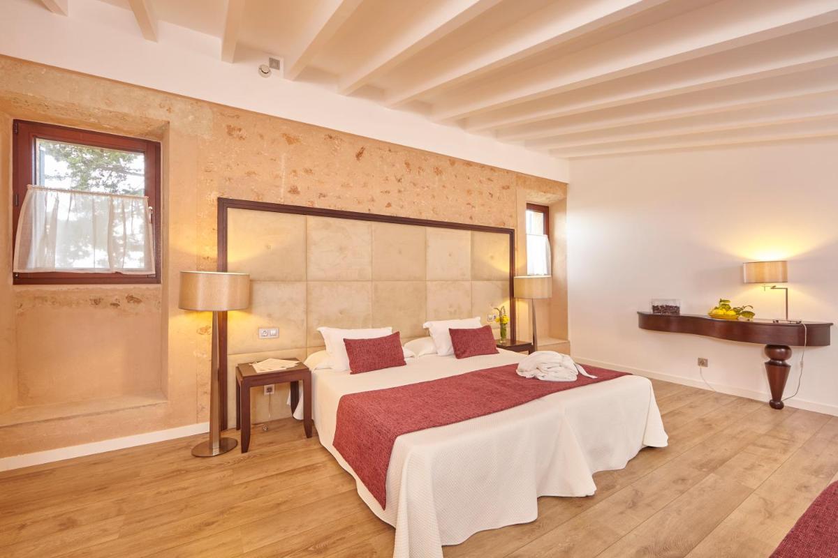 Cama o camas de una habitación en Bennoc Petit Hotel - Only Adults
