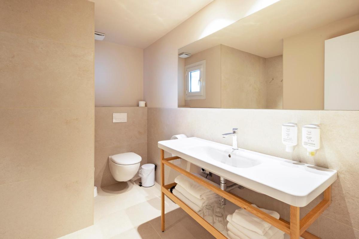 Un baño de Hotel Maritim 4 Superior