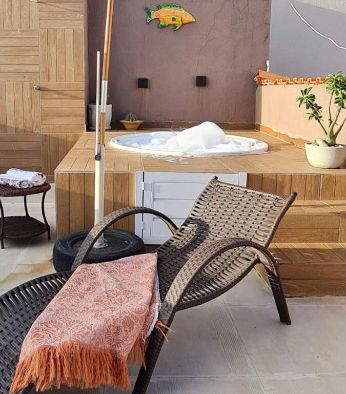 Suitetrails - Relaxe na banheira de hidromassagem com vista mar