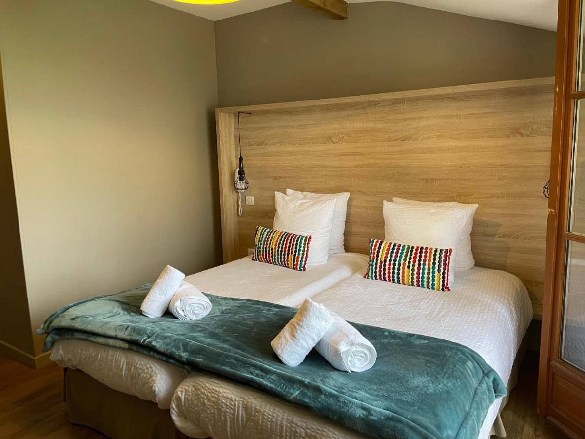 Un ou plusieurs lits dans un hébergement de l'établissement Hotel Mendionde