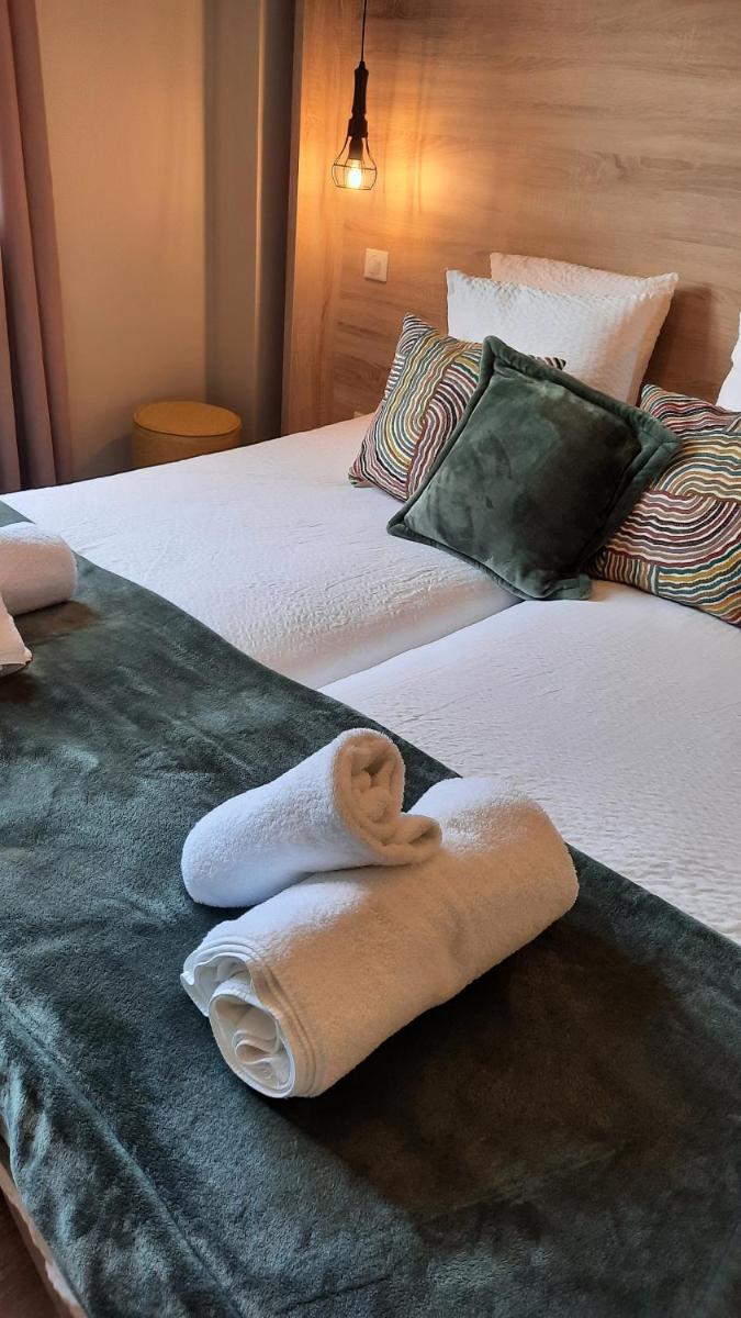 Un ou plusieurs lits dans un hébergement de l'établissement Hotel Mendionde