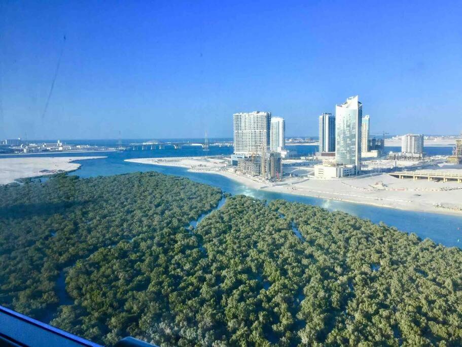 Cozy Upgraded Residential Flat with sea, Mangrove, pool view - 1203 Not Hotel - Housity