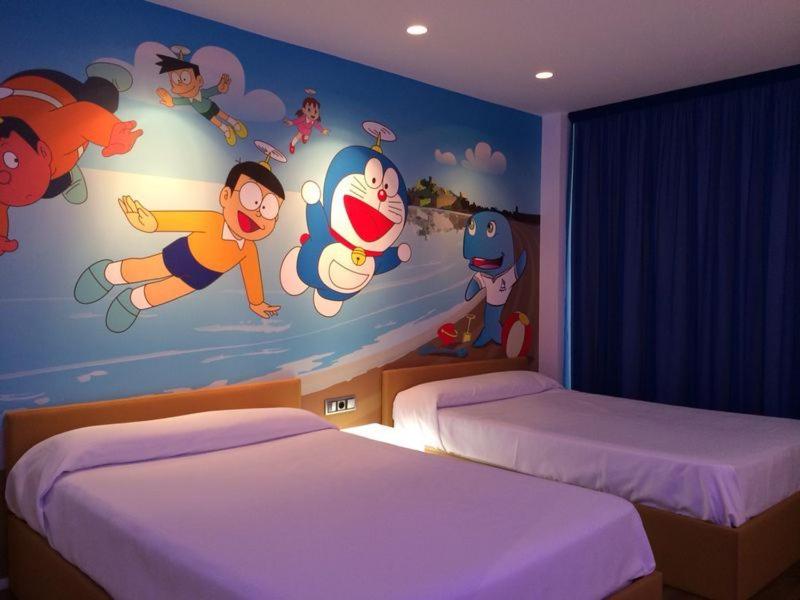 Cama o camas de una habitación en Hotel Acuazul